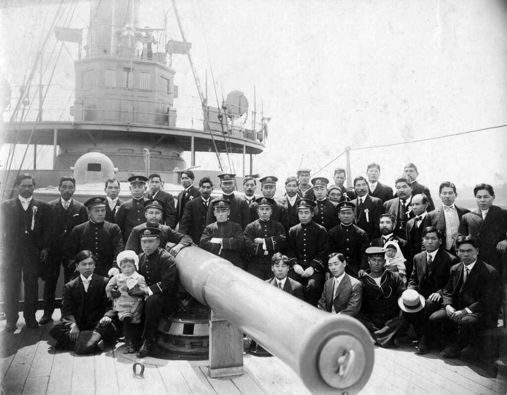 Crew of a Japanese battleship posing with a welcoming delegation in Vancouver, circa 1909-1914. NNM 2010.31.25.